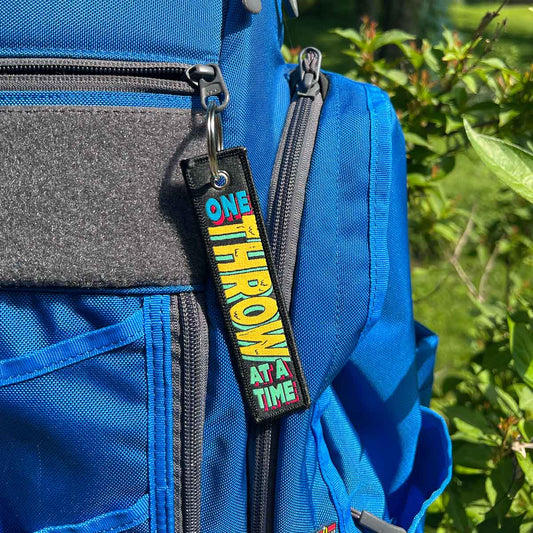 One Throw Disc Golf Fabric Keychain®